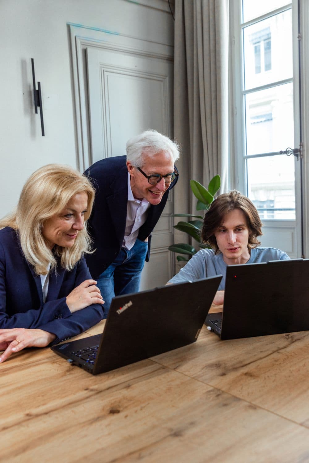 Smartemis France Team Members Reviewing Presentation